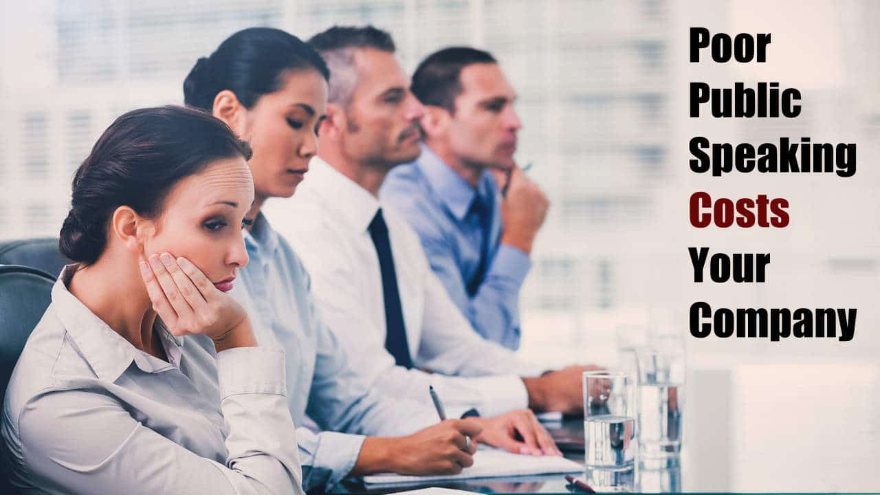4 business people look onto a presentation. 1 is visible bored. 1 is doodling. 1 looking off into the distance. The text "Poor Public Speaking Costs Your Company" is seen in the direction they are facing.